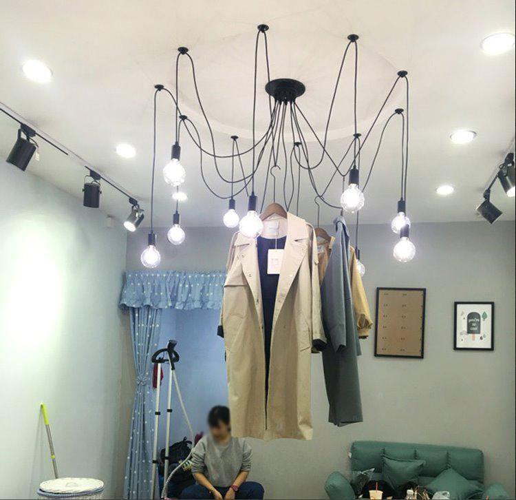 Close-up of matte black pendant light sockets and wires Lumotrot