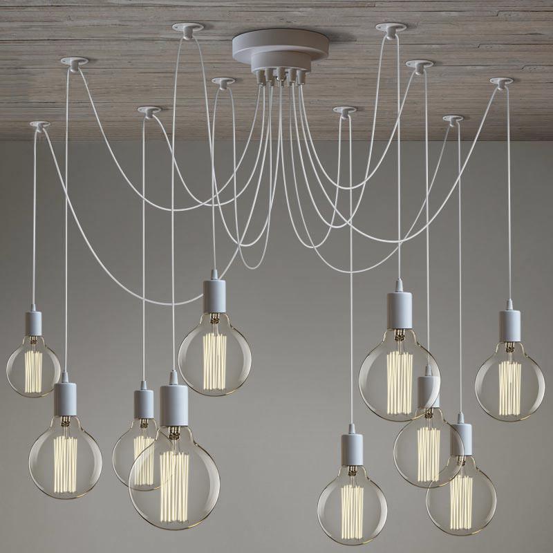 Unique spider-like silhouette of matte black pendant light Lumotrot