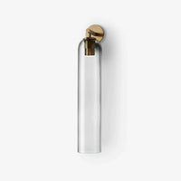 Clear blown glass and brass wall sconce, minimalist design, Lumotrot