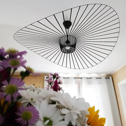 Unique sweeping silhouette of the black metal wire pendant light