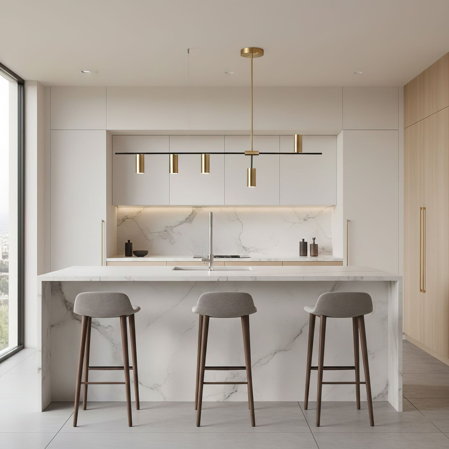 Close-up of brushed brass cylinders on black linear light fixture