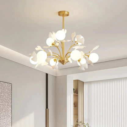 Elegant living room illuminated by a nature-inspired ceramic leaf chandelier