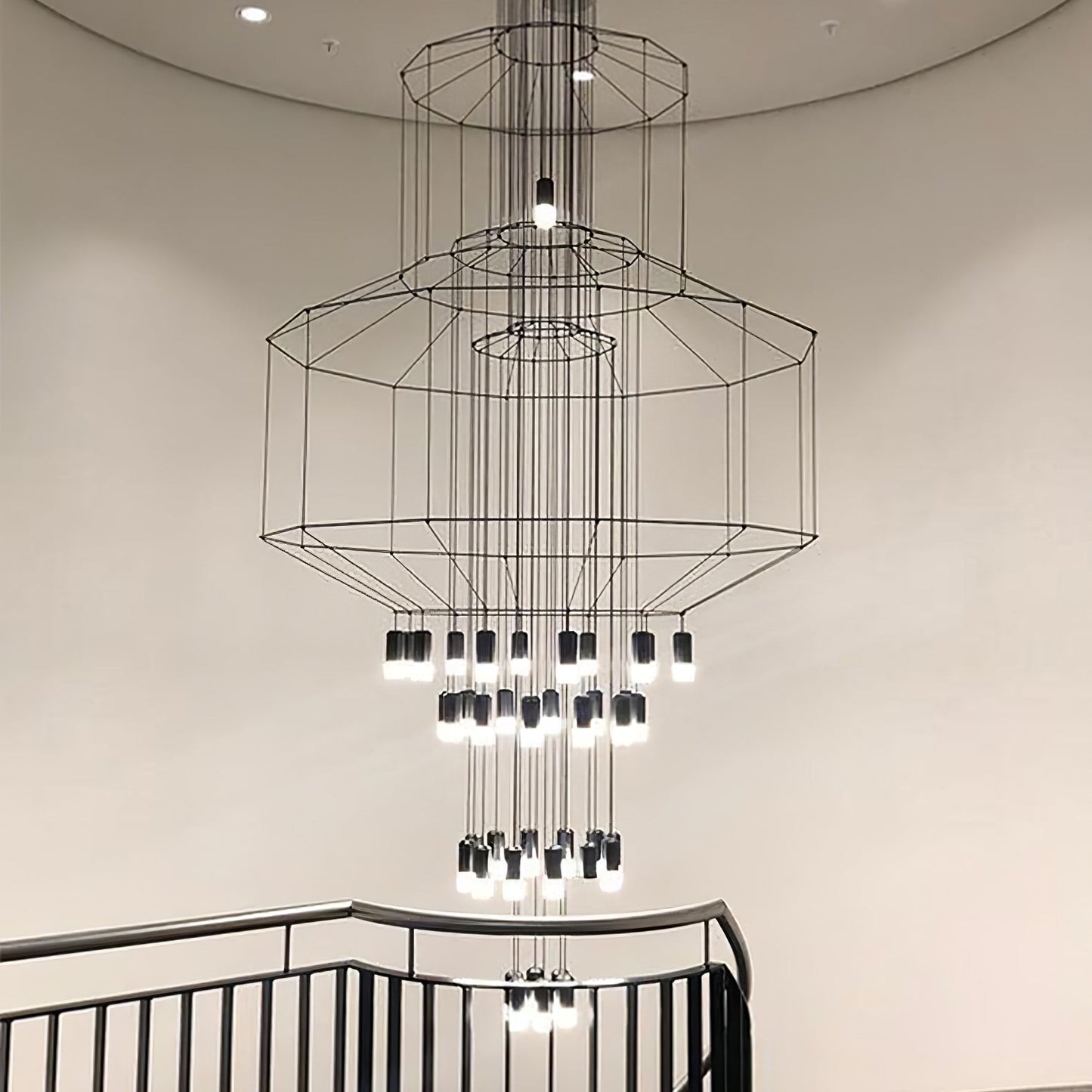 Installation view of the geometric wire frame chandelier scale