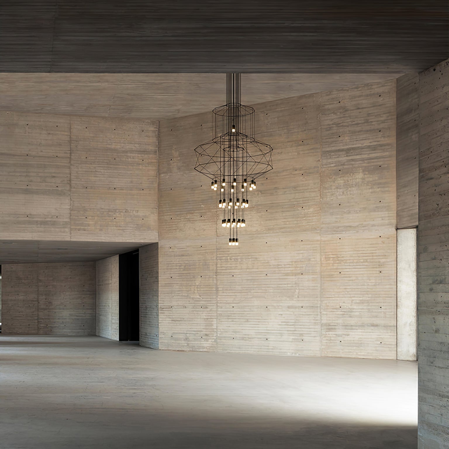 Tiered geometric silhouette of the black wire frame chandelier