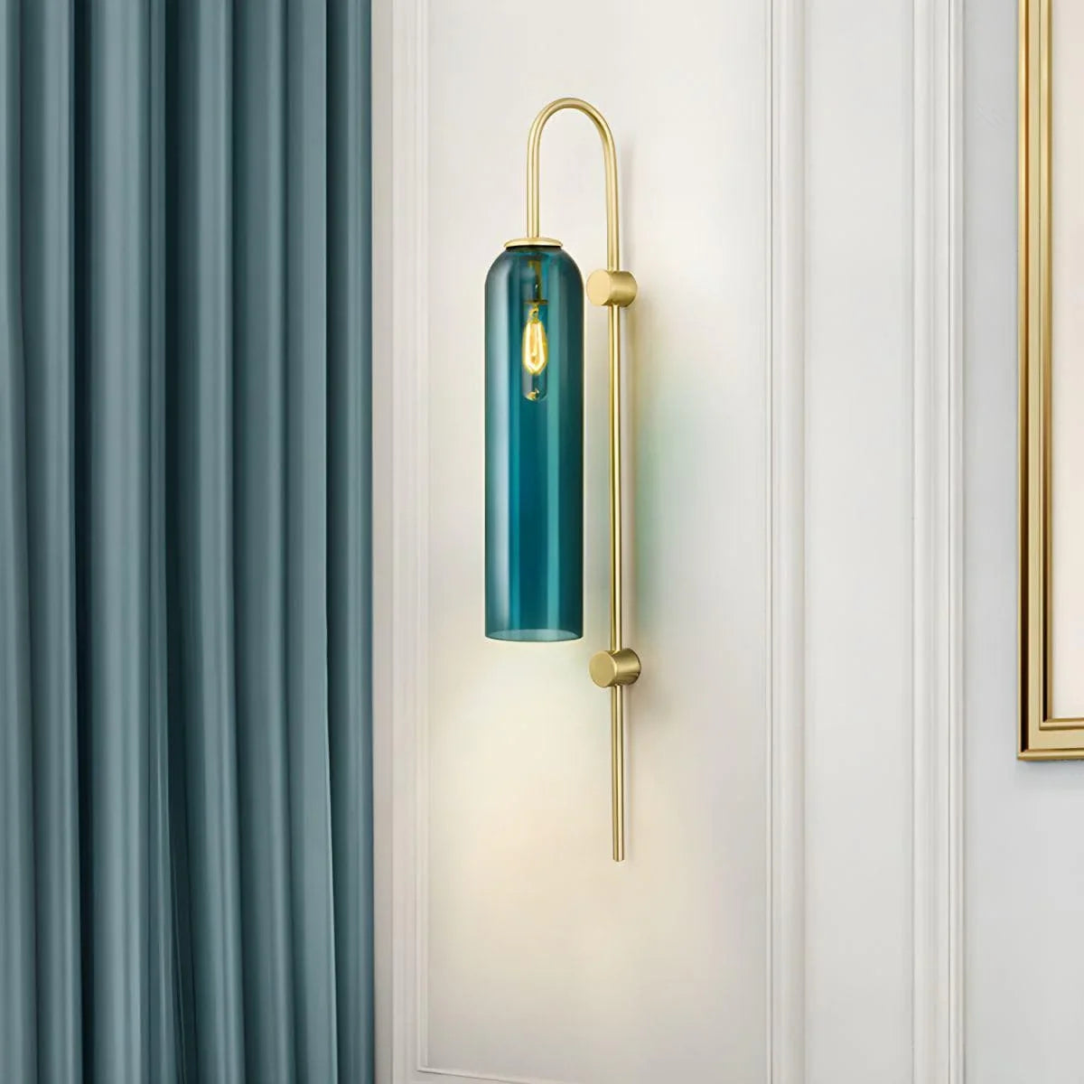 Close-up of vibrant teal blown glass texture on Lumotrot wall sconce