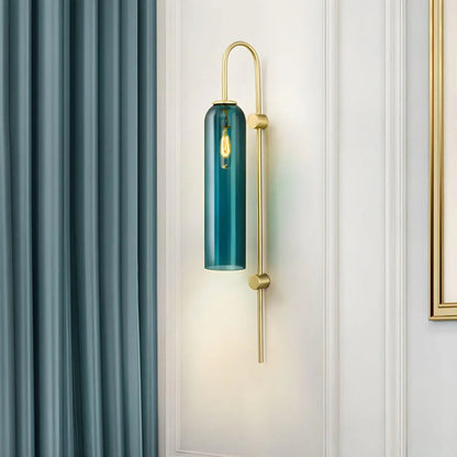 Close-up of vibrant teal blown glass texture on Lumotrot wall sconce