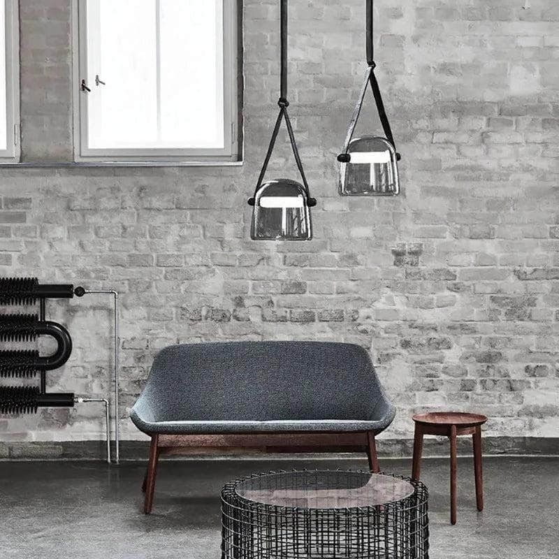 Scale and suspension detail of smoked glass pendant light Lumotrot