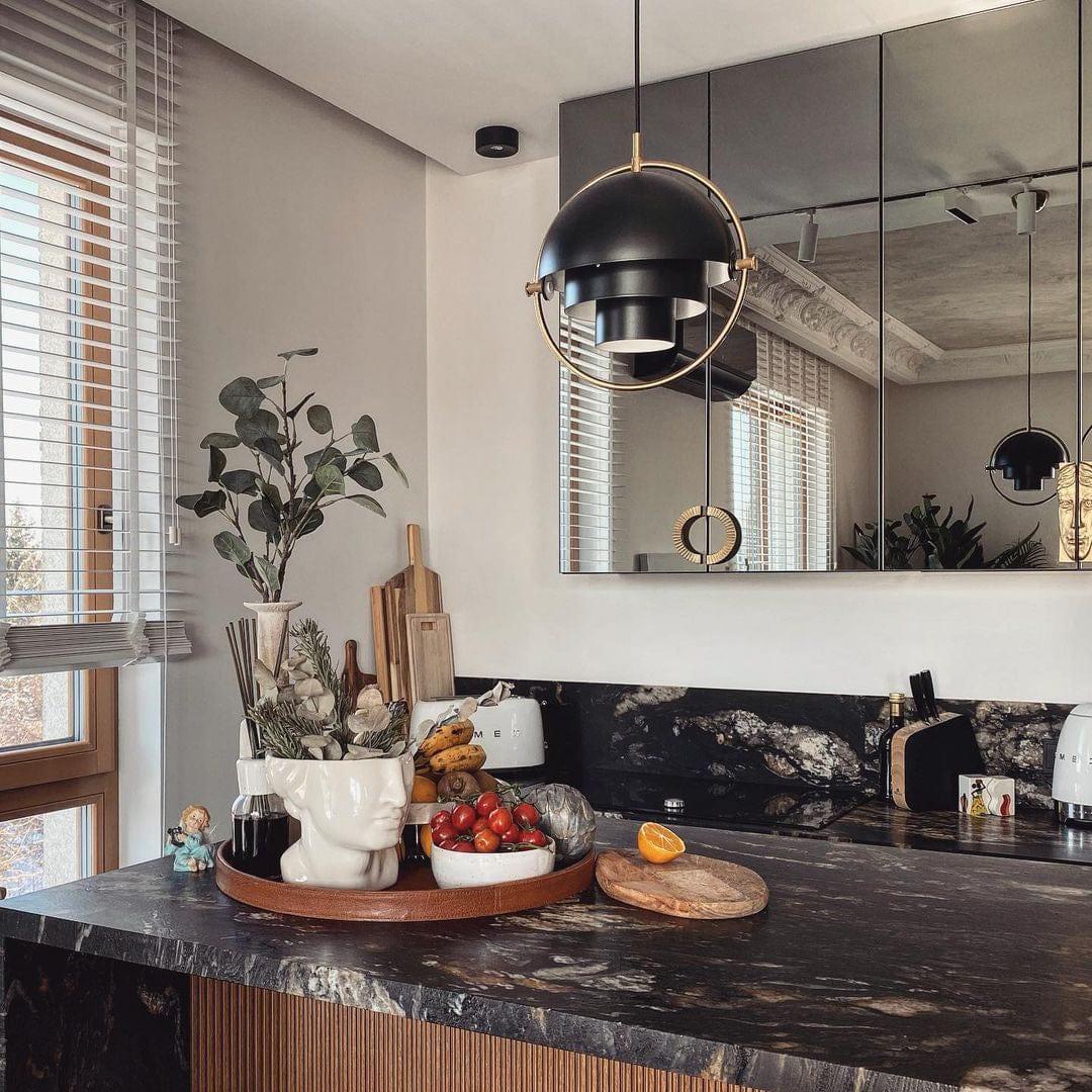 Living room atmosphere with unique brass pendant light