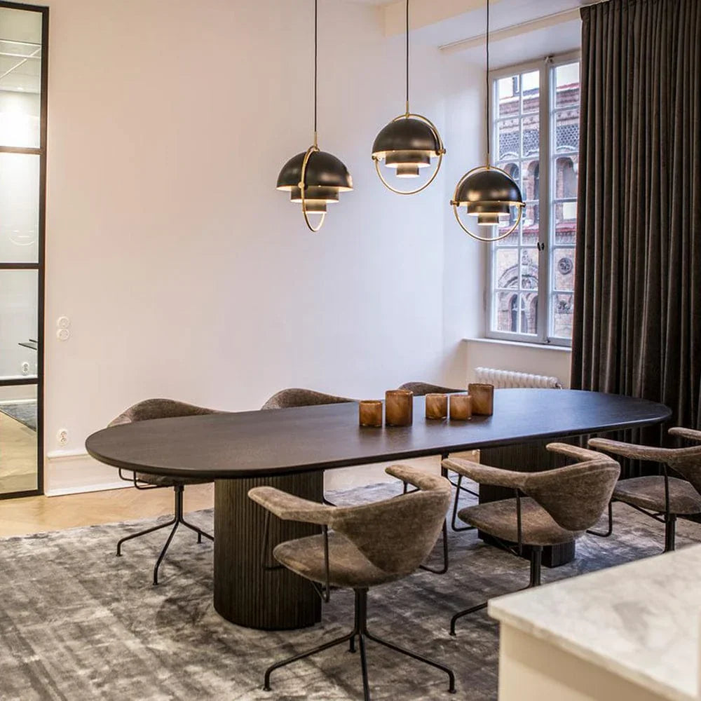 Geometric circular silhouette of brass pendant light