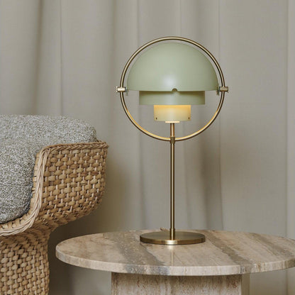 Ambient light created by the brass table lamp in a stylish living room setting