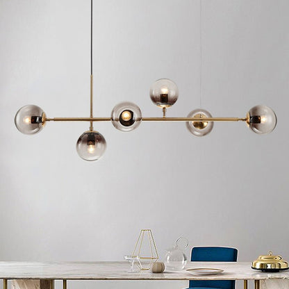 Modern living room ambiance enhanced by a brass glass orb chandelier