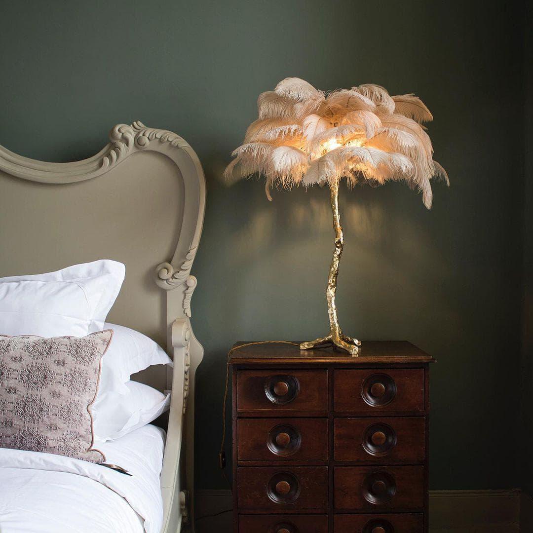 Sculptural brass branch base of the feather table lamp