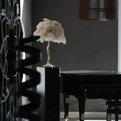 Table lamp with brass base and feather shade, showing dimensions