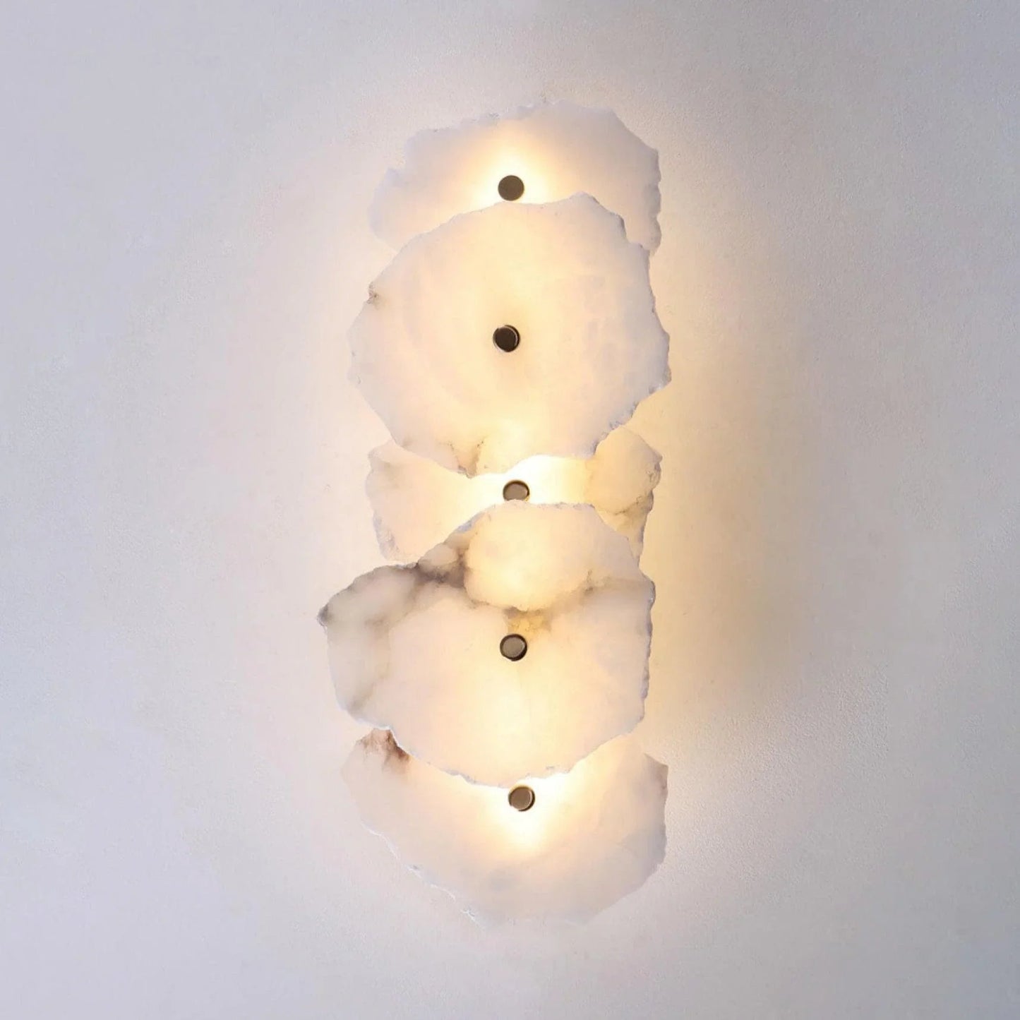 Wall mounting detail of the unique alabaster sconce