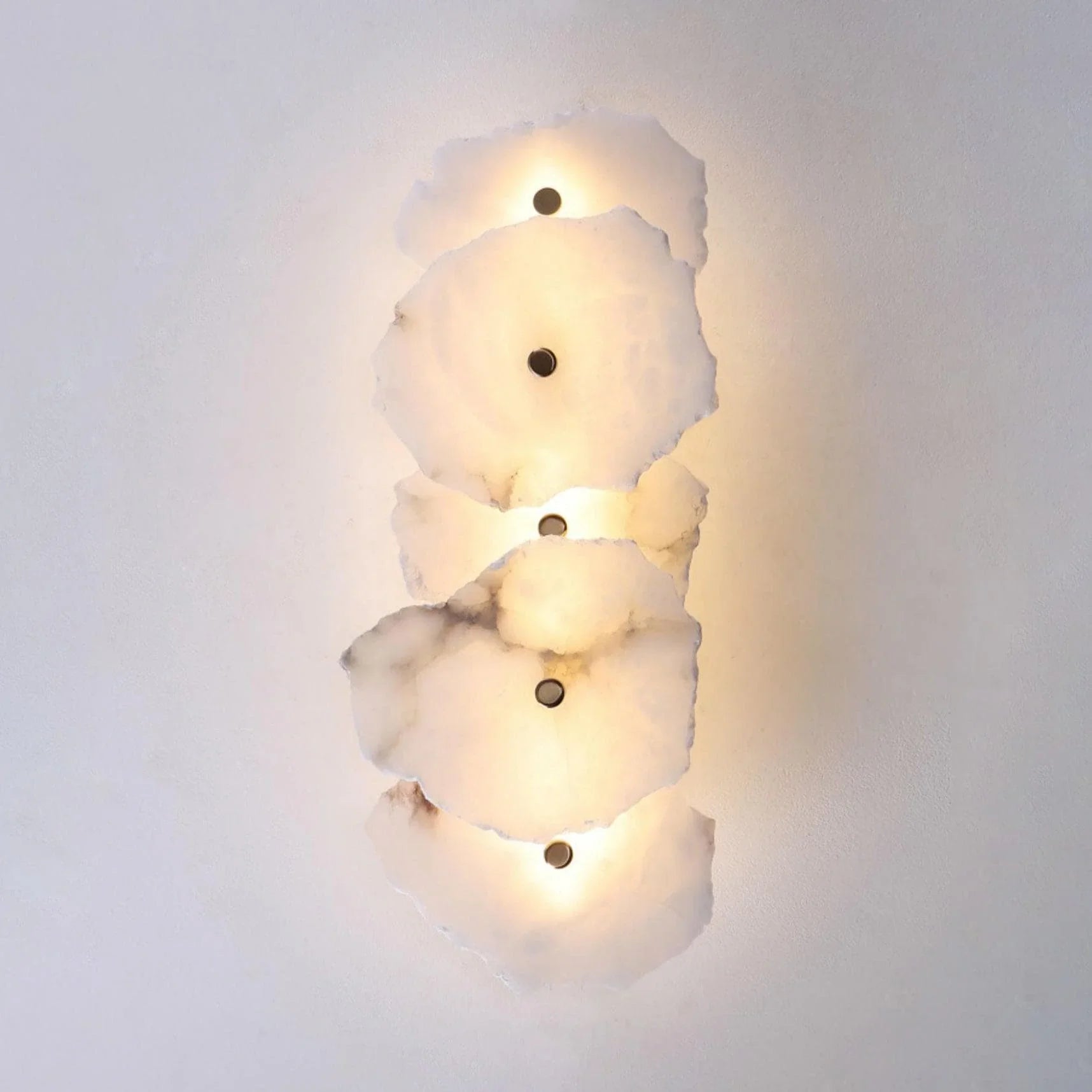 Wall mounting detail of the unique alabaster sconce