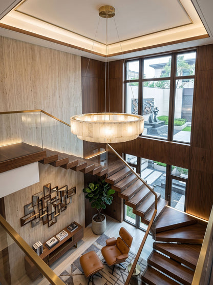 Brass canopy and suspension cables for the alabaster chandelier