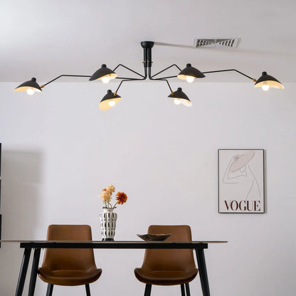 Installation view of a black metal ceiling light with adjustable arms