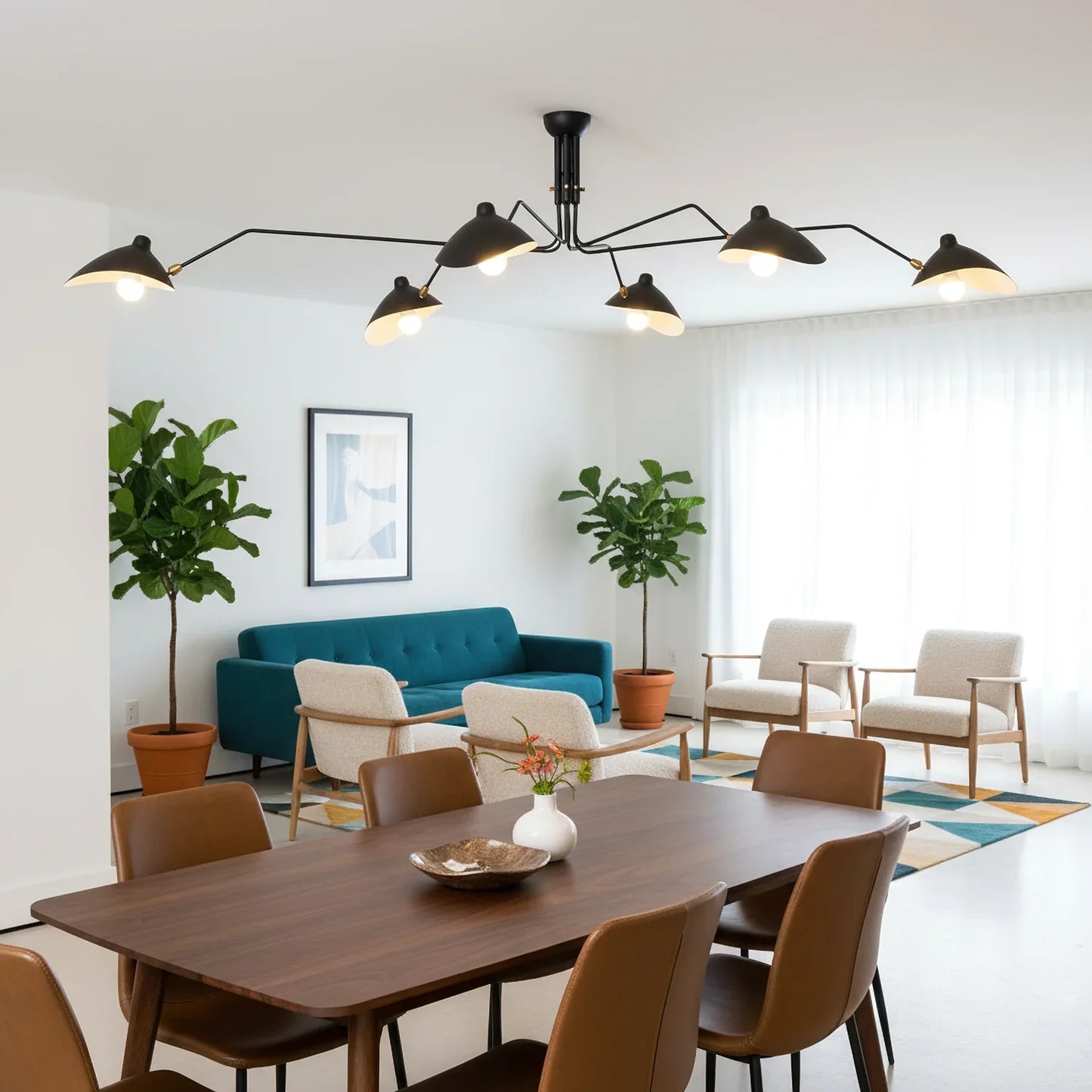 Living room ambiance with a black metal mid-century ceiling light by Lumotrot