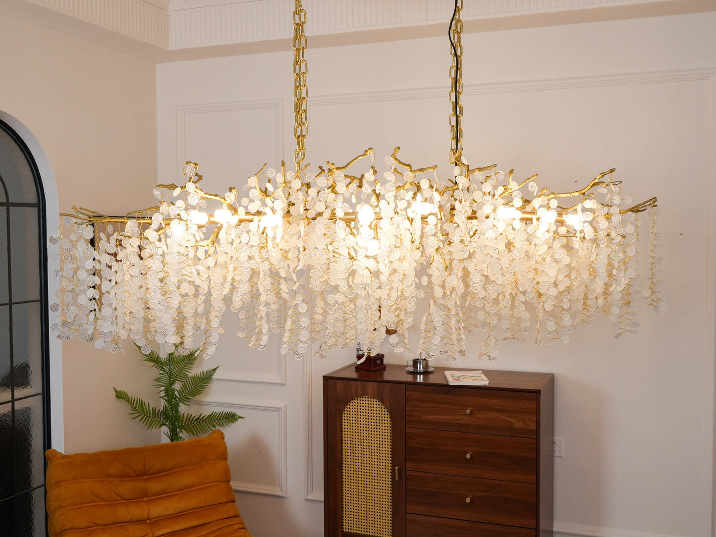 Rectangular brass chandelier silhouette with organic branch details