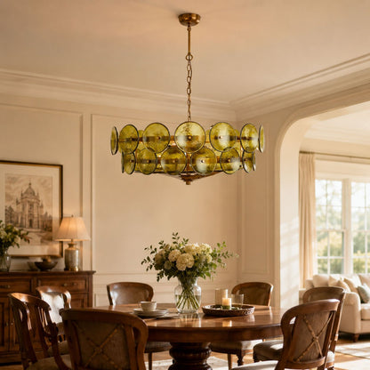 Living room ambiance with a warm amber glass disc chandelier