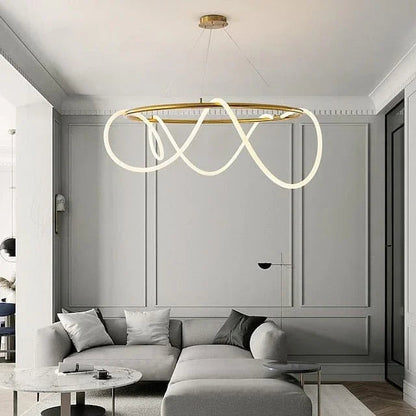 Fluid silhouette of the brass LED pendant light