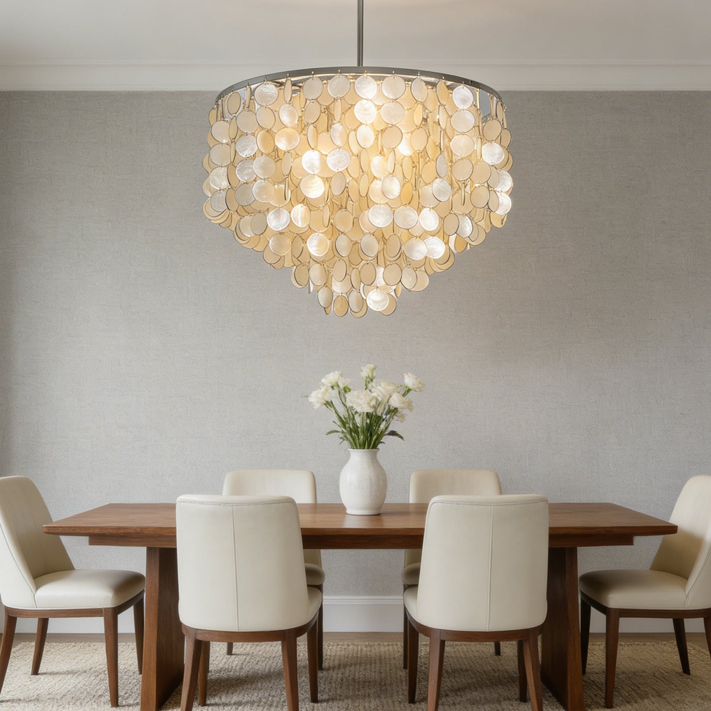 Luminous capiz shell chandelier creating a soft ambiance in a dining room