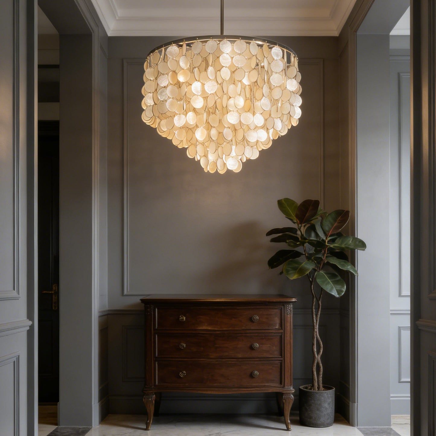 Chandelier creating a warm and ethereal glow in a stylish room