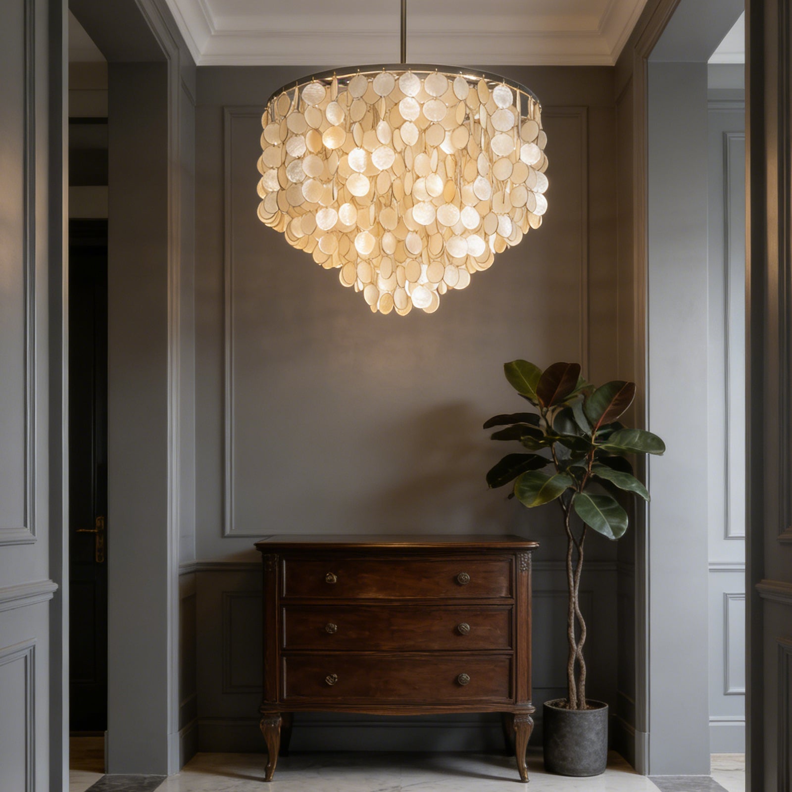 Chandelier creating a warm and ethereal glow in a stylish room
